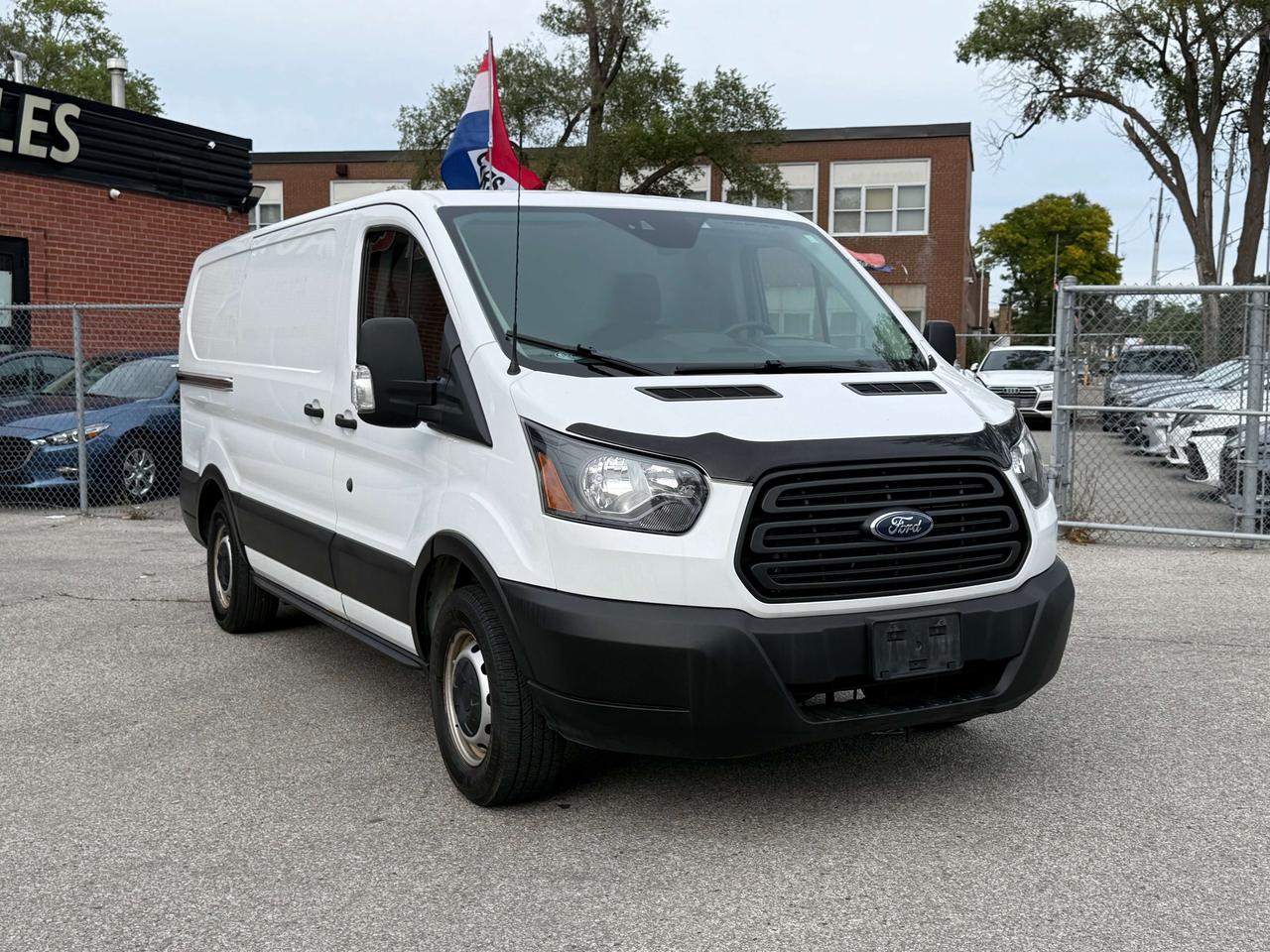 2019 Ford Transit Low Roof l T150 l RWD l 130" l Reverse Cam l V6 l Photo