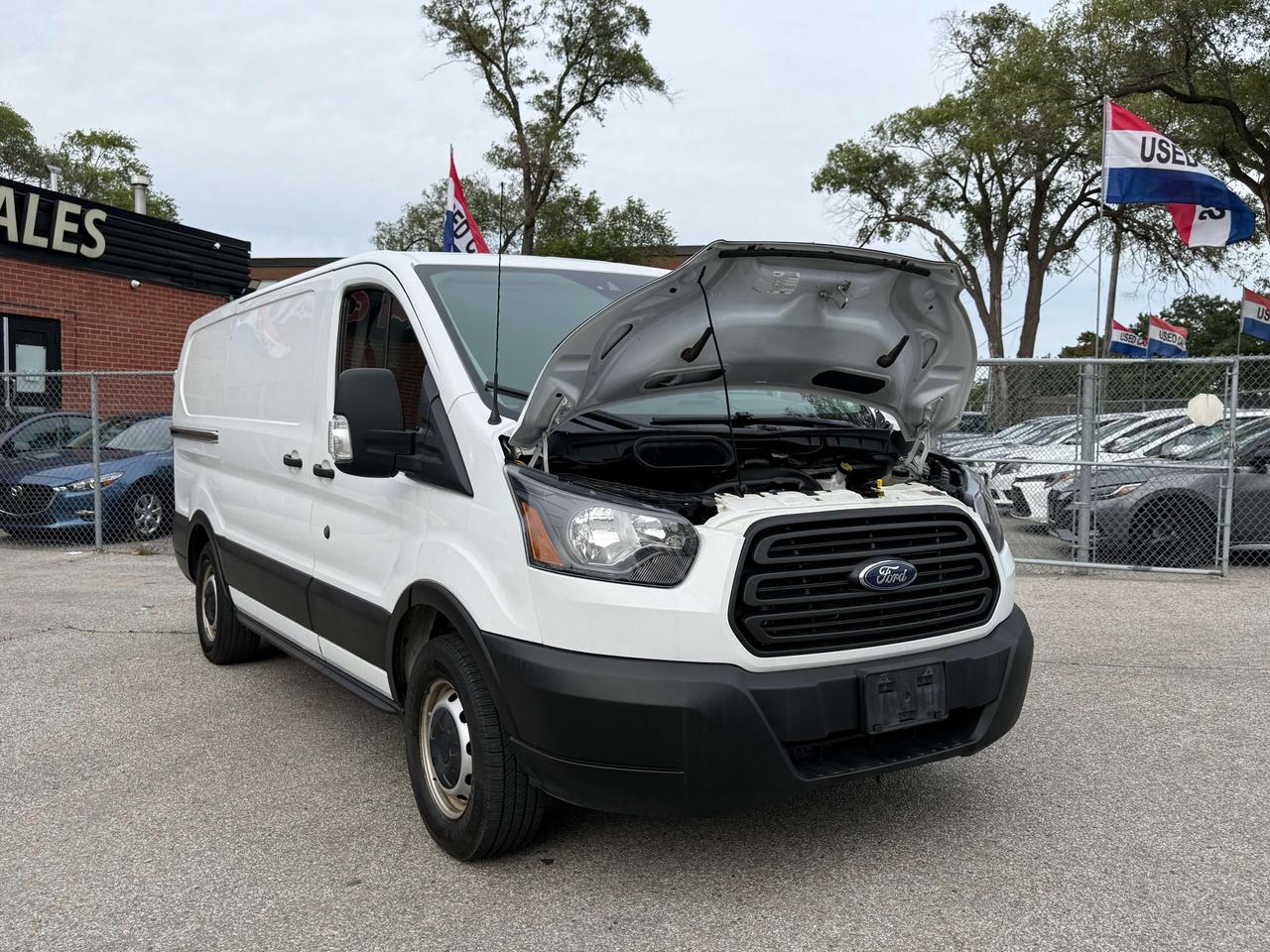 2019 Ford Transit Low Roof l T150 l RWD l 130" l Reverse Cam l V6 l Photo