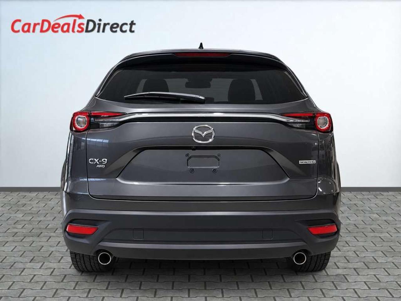 2021 Mazda CX-9 TOURING AWD / Leather / NAVI / Sunroof / 7-Passenger / Heated Seats / Backup Camera Photo