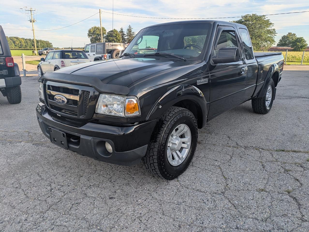 Black 2011 Ford Ranger Pickup Truck Four-Wheel Drive Automatic