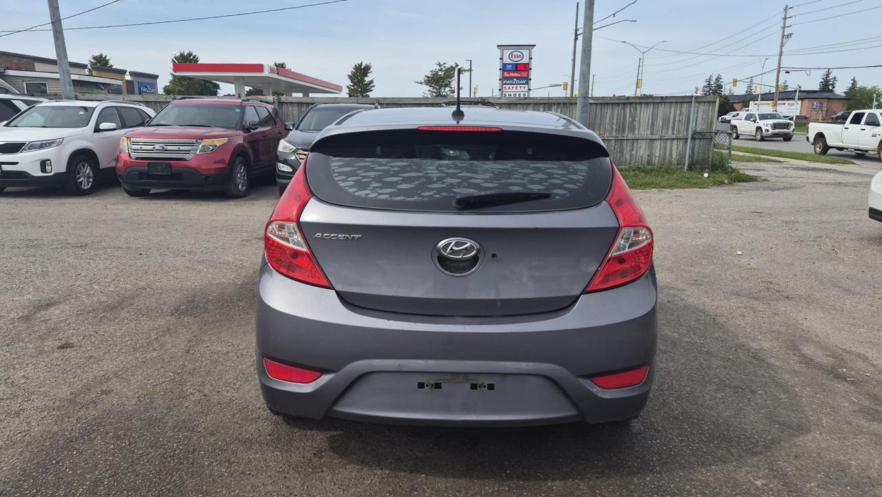 2015 Hyundai Accent AS IS,SE, HATCH, AUTO, 195KM, 4 CYL, GREAT ON FUEL Photo