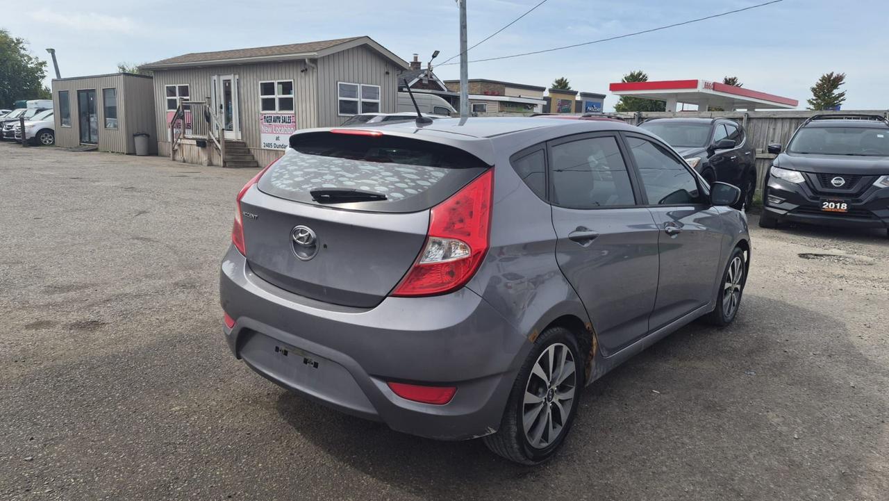 2015 Hyundai Accent AS IS,SE, HATCH, AUTO, 195KM, 4 CYL, GREAT ON FUEL Photo