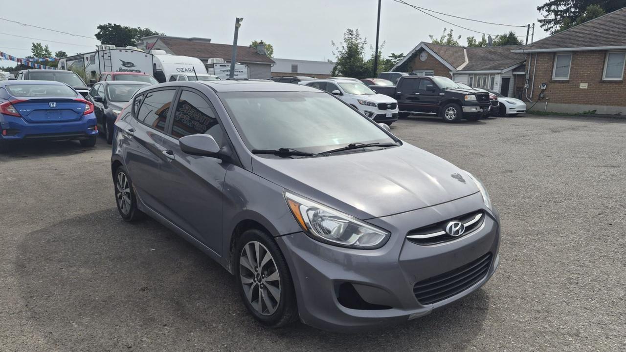 2015 Hyundai Accent AS IS,SE, HATCH, AUTO, 195KM, 4 CYL, GREAT ON FUEL Photo