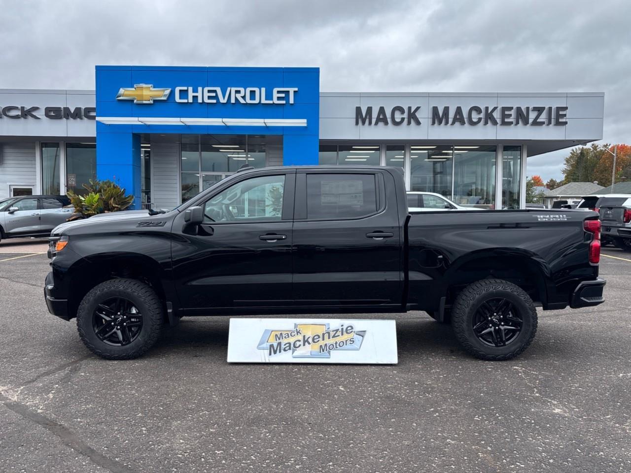 2026 Chevrolet Silverado 1500 Custom Trail Boss New 2026 Gas Powered V8 6 Passenger Crew Cab 4X4 Truck with a 2 Factory Installed Lift, Push Button Start with Remote Vehicle Start and a 7 Diagonal Touchscreen Radio with Wireless Apple CarPlay and W Photo