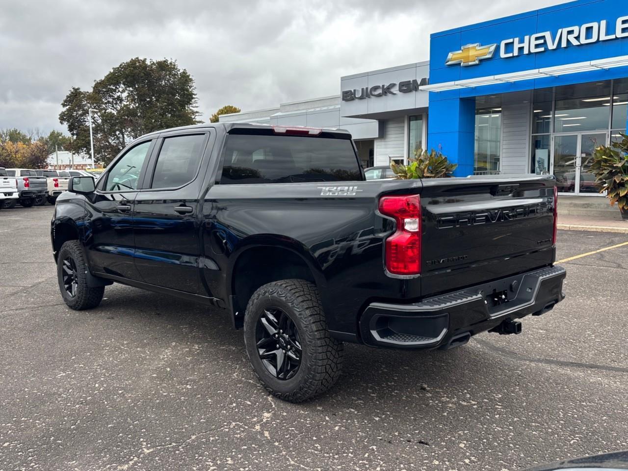 2026 Chevrolet Silverado 1500 Custom Trail Boss New 2026 Gas Powered V8 6 Passenger Crew Cab 4X4 Truck with a 2 Factory Installed Lift, Push Button Start with Remote Vehicle Start and a 7 Diagonal Touchscreen Radio with Wireless Apple CarPlay and W Photo