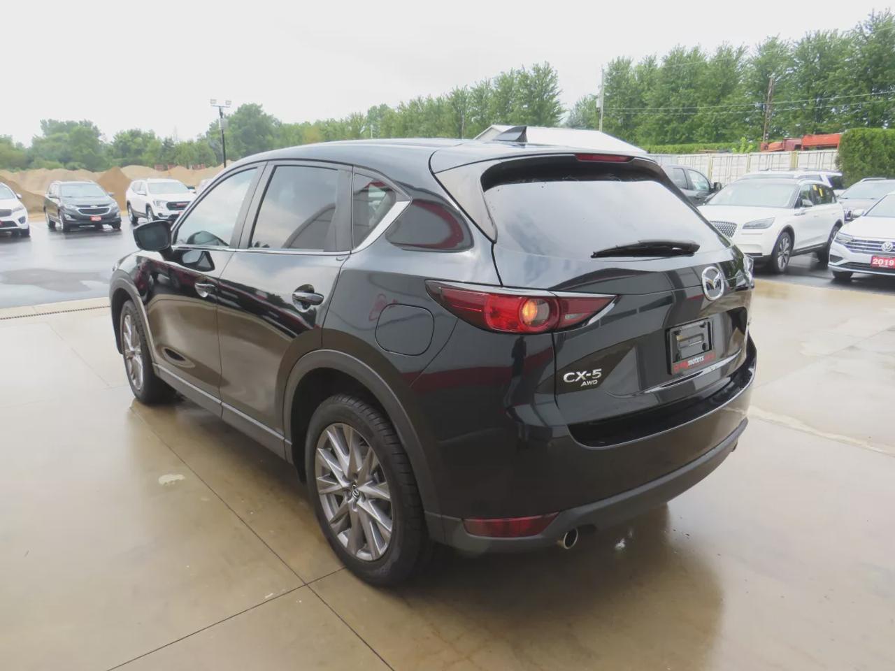 2021 Mazda CX-5 GS | AWD | Automatic | Alloy Wheels | Heated Seats | Heated Steering Wheel | Power Driver Seat | Dual-Zone Climate Control | Touchscreen Display | Android Auto & Apple CarPlay | Bluetooth | Power Liftgate | Back-Up Camera | Adaptive Cruise Control | Blind Photo