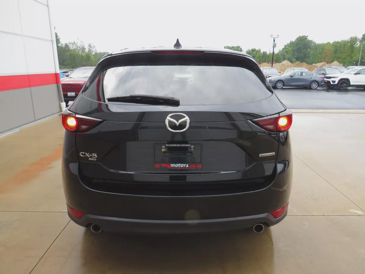 2021 Mazda CX-5 GS | AWD | Automatic | Alloy Wheels | Heated Seats | Heated Steering Wheel | Power Driver Seat | Dual-Zone Climate Control | Touchscreen Display | Android Auto & Apple CarPlay | Bluetooth | Power Liftgate | Back-Up Camera | Adaptive Cruise Control | Blind Photo