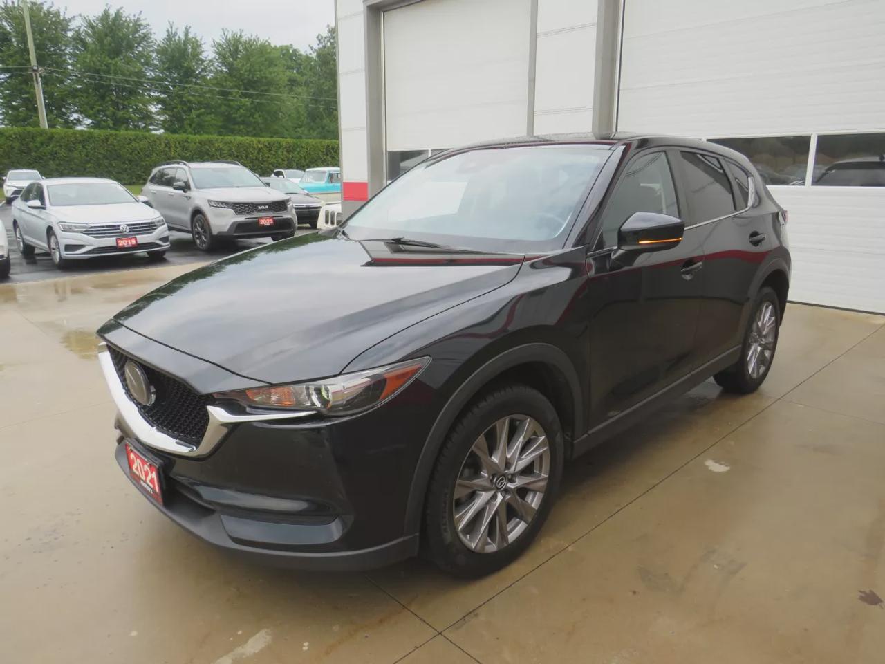 2021 Mazda CX-5 GS | AWD | Automatic | Alloy Wheels | Heated Seats | Heated Steering Wheel | Power Driver Seat | Dual-Zone Climate Control | Touchscreen Display | Android Auto & Apple CarPlay | Bluetooth | Power Liftgate | Back-Up Camera | Adaptive Cruise Control | Blind Photo