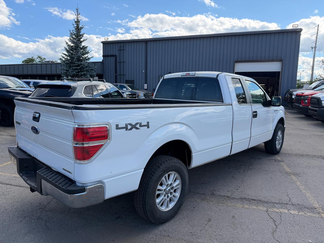 2014 Ford F-150 4WD SUPERCAB 145" XLT Photo3