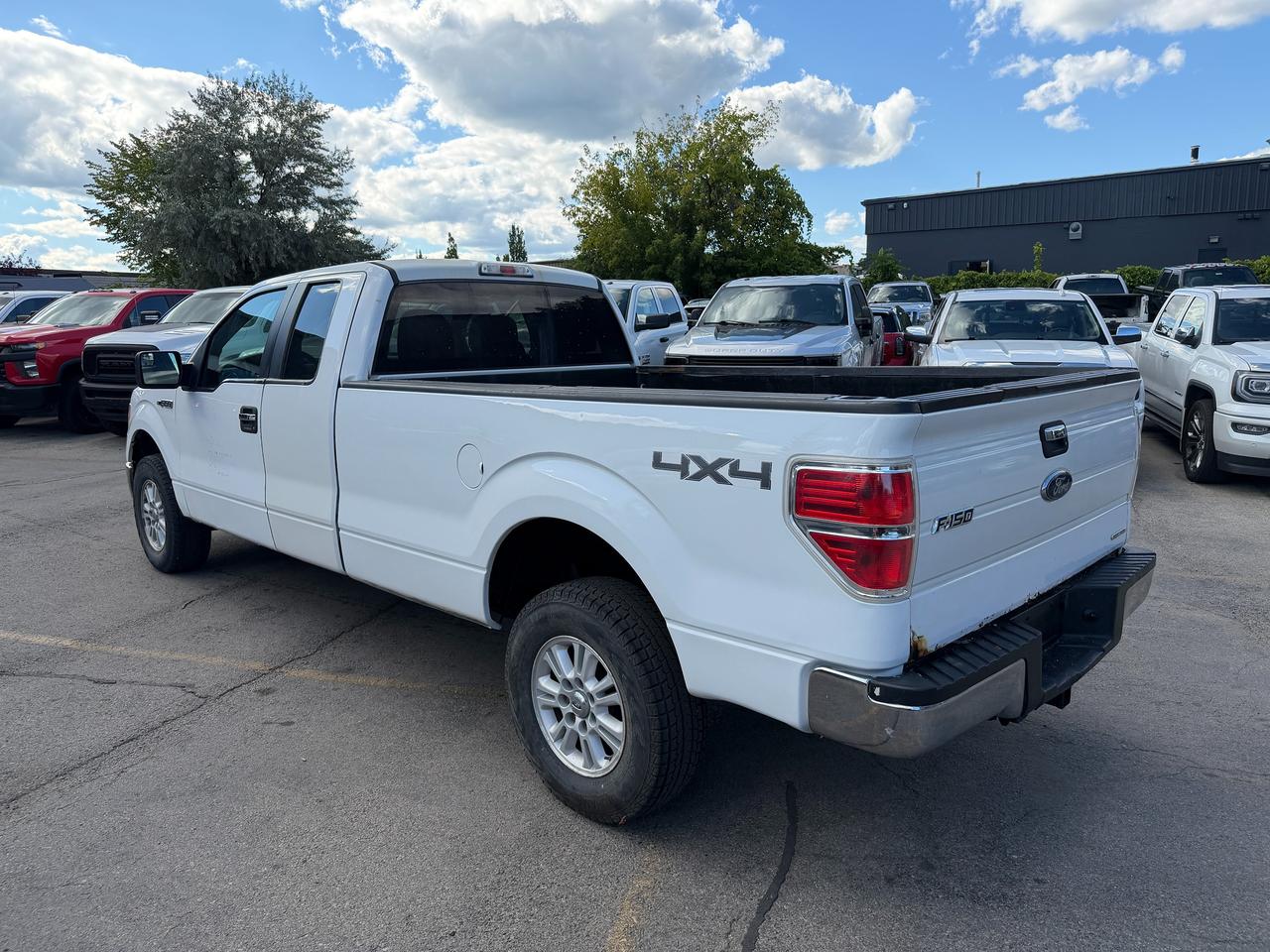 2014 Ford F-150 4WD SUPERCAB 145" XLT Photo4