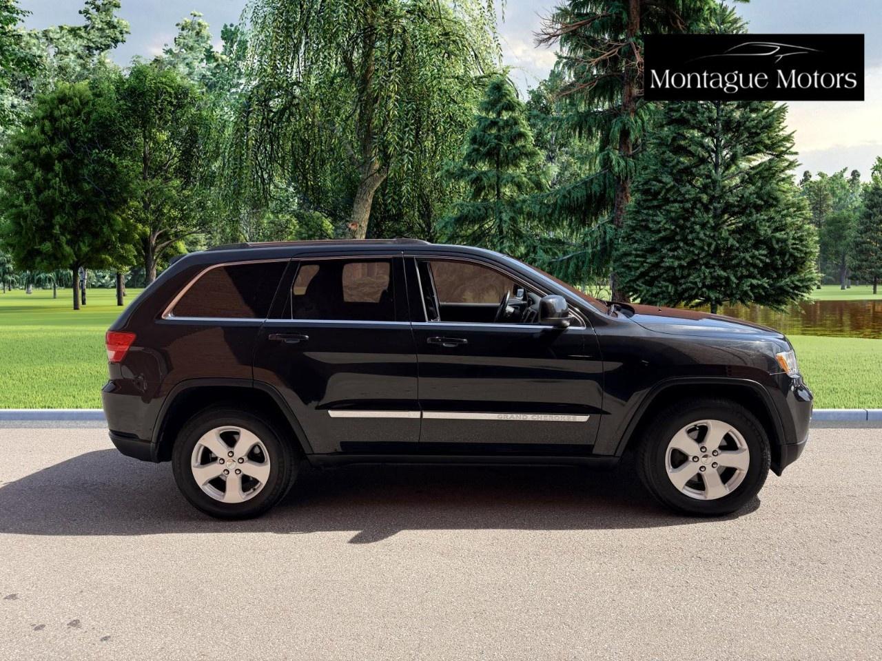 2013 Jeep Grand Cherokee 4WD 4Dr Laredo Photo