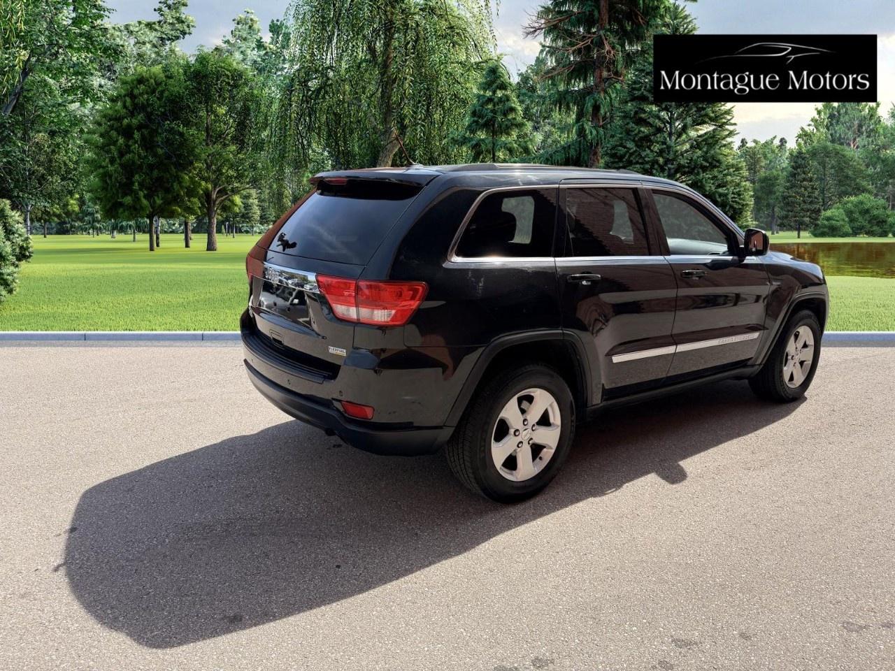 2013 Jeep Grand Cherokee 4WD 4Dr Laredo Photo