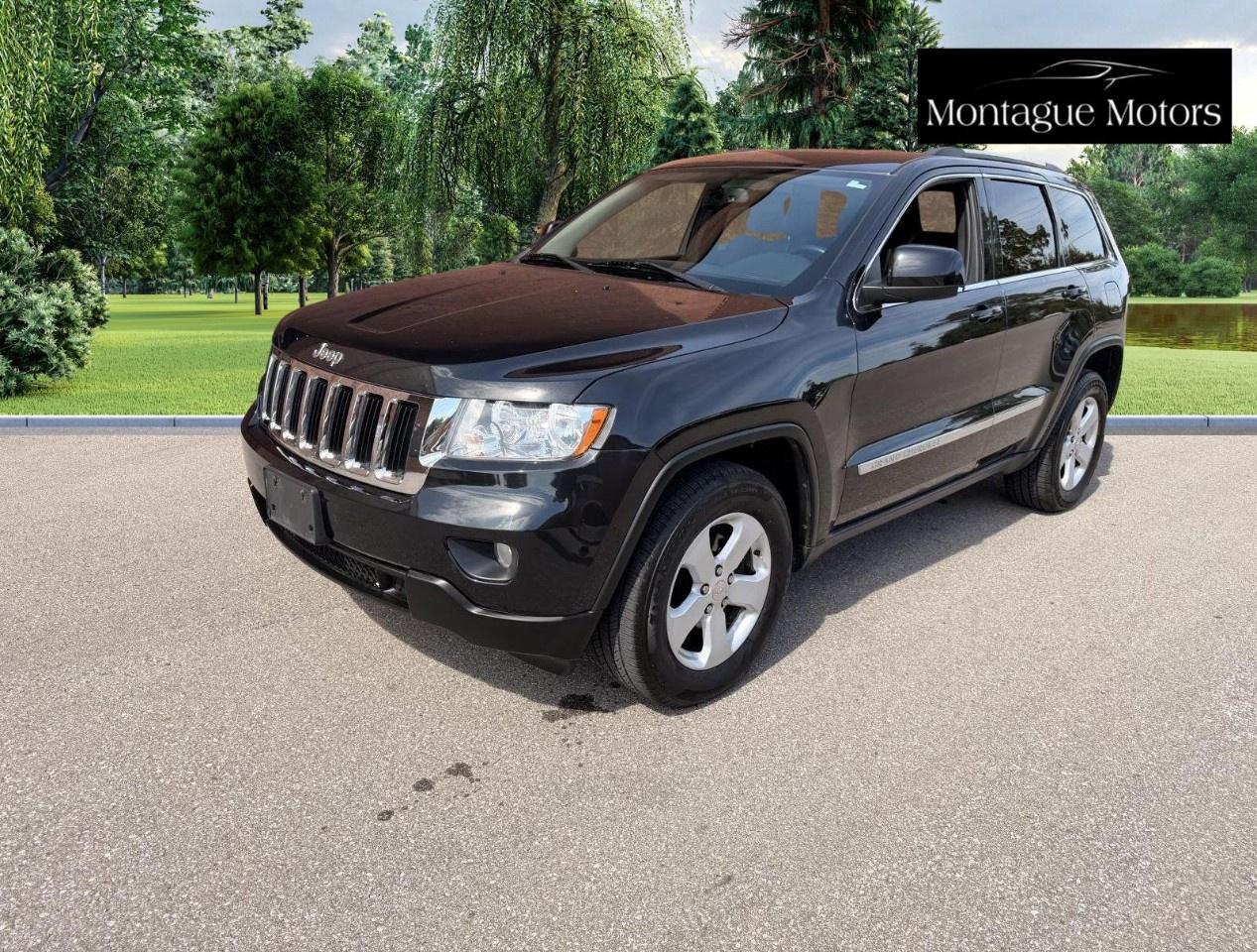 2013 Jeep Grand Cherokee 4WD 4Dr Laredo Photo