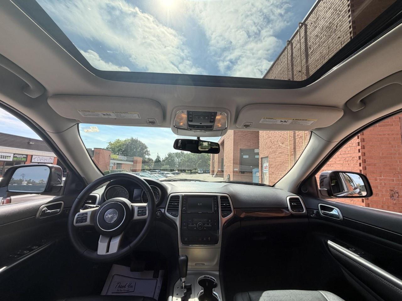 2013 Jeep Grand Cherokee 4WD 4Dr Laredo Photo