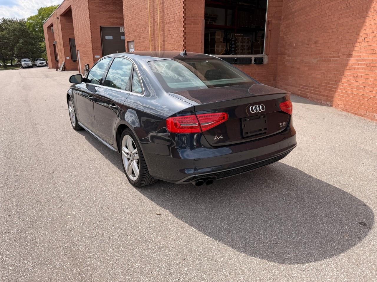 2015 Audi A4 4dr Sdn Auto Technik plus quattro Photo