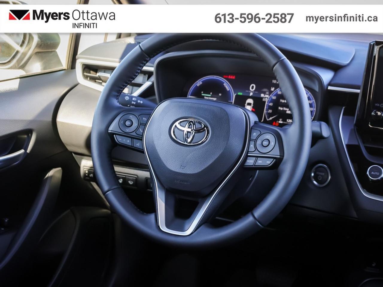 2026 Toyota Corolla Hybrid SE AWD  Sunroof, Like New!! LOW kms!! Photo