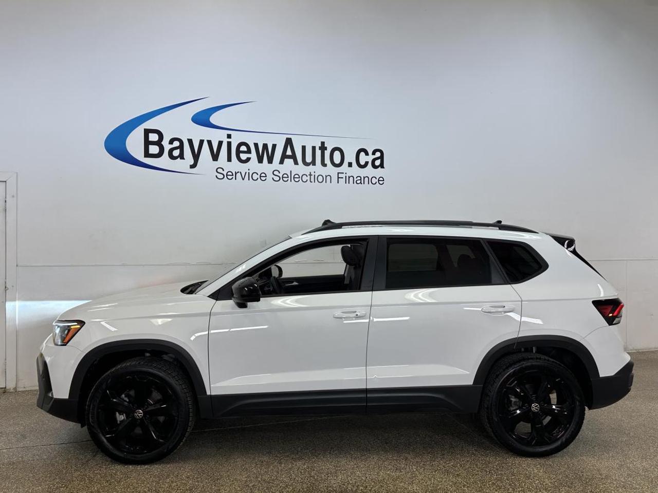 2025 Volkswagen Taos Comfortline Black Edition COMFORTLINE/AWD/BLACK EDITION/PANOROOF/LEATHER/6400KM/VW DIRECT! Photo