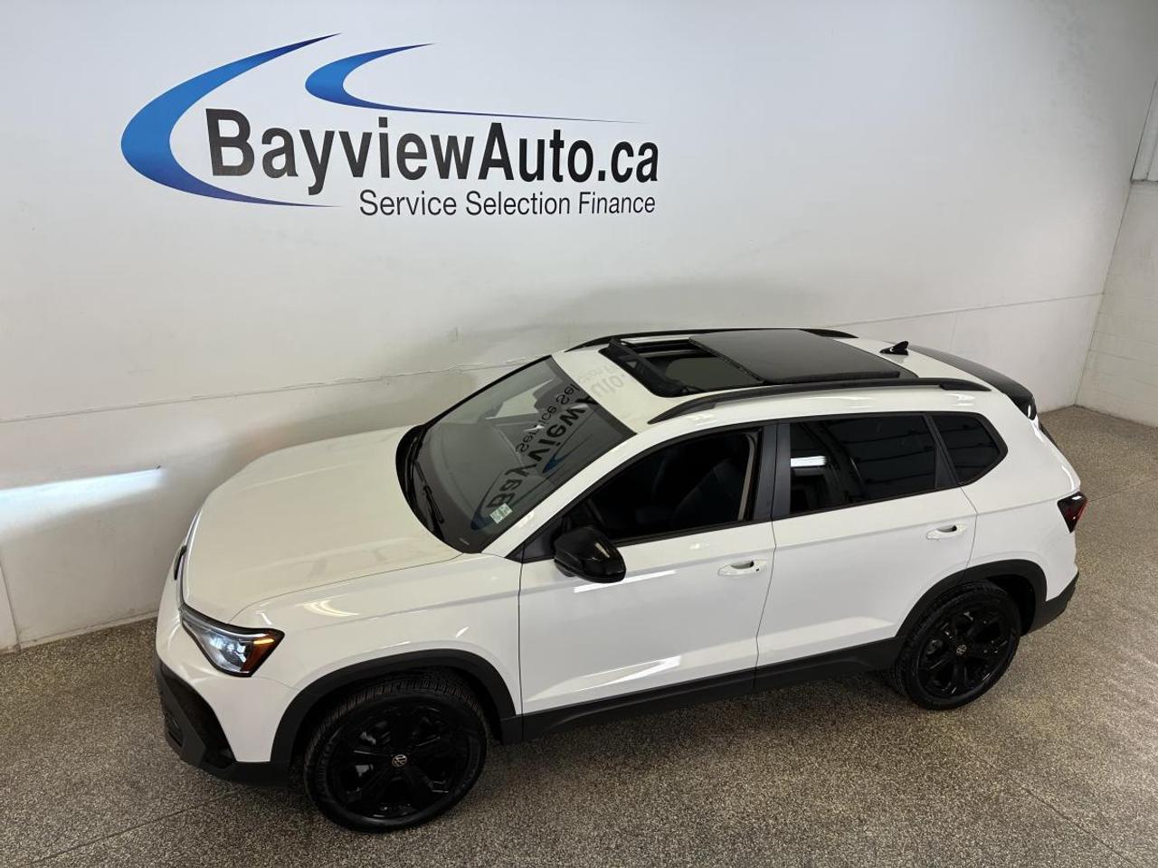 2025 Volkswagen Taos Comfortline Black Edition COMFORTLINE/AWD/BLACK EDITION/PANOROOF/LEATHER/6400KM/VW DIRECT! Photo