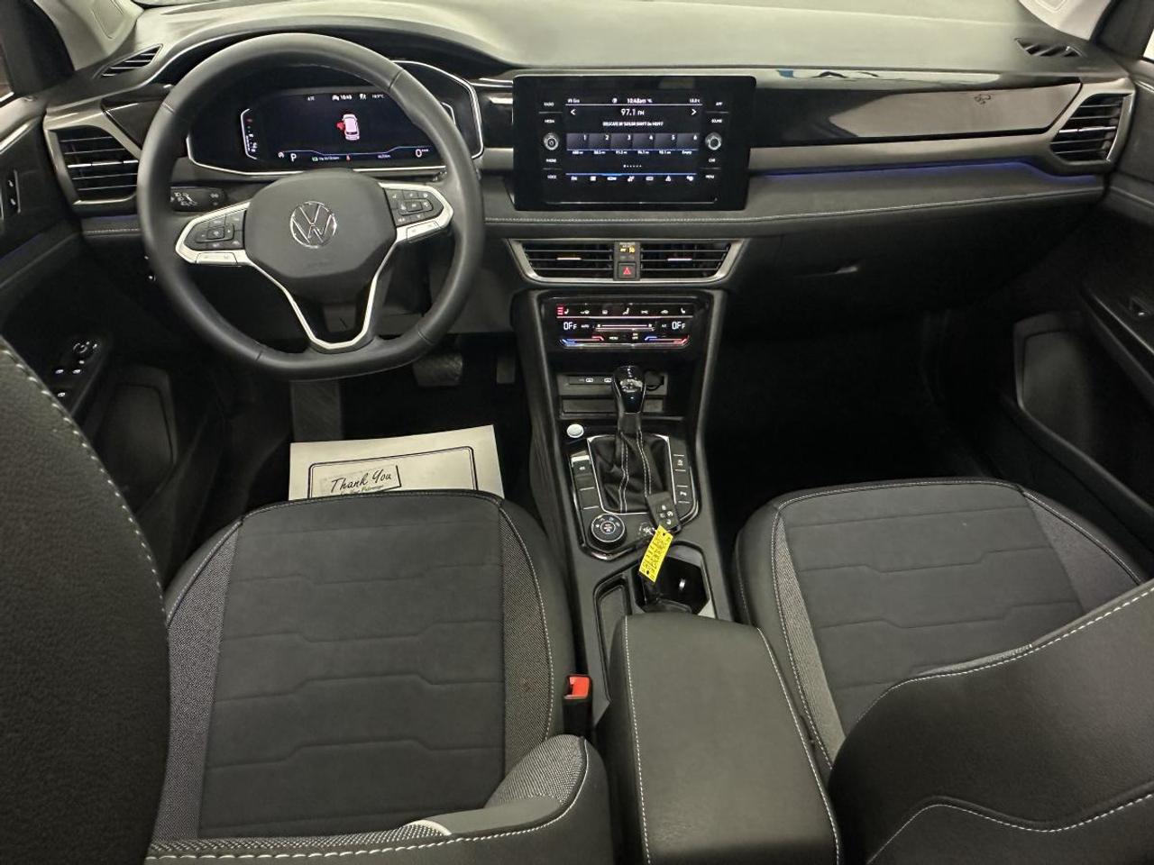 2025 Volkswagen Taos Comfortline Black Edition COMFORTLINE/AWD/BLACK EDITION/PANOROOF/LEATHER/6400KM/VW DIRECT! Photo