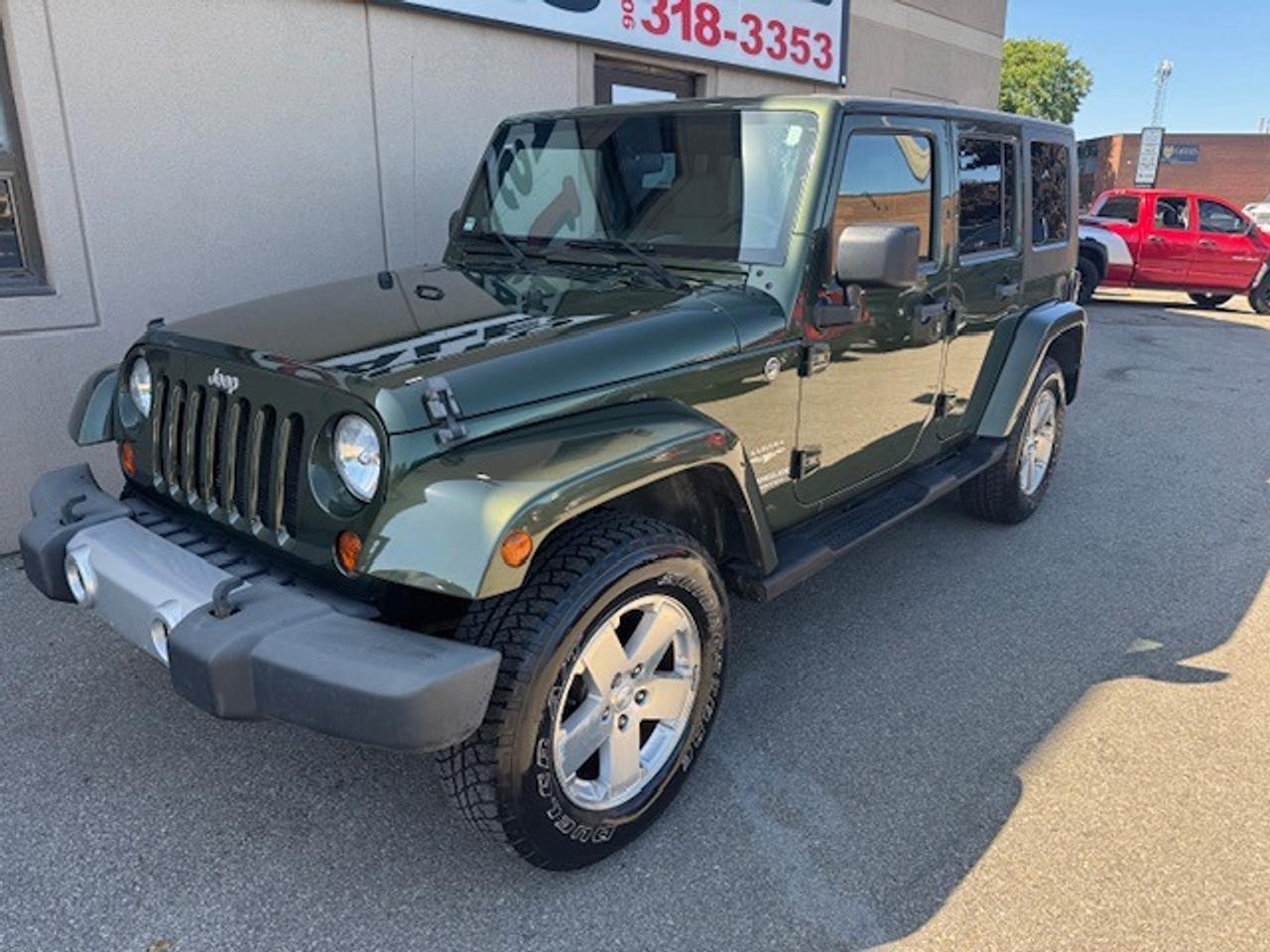 2009 Jeep Wrangler 4WD 4DR SAHARA Photo