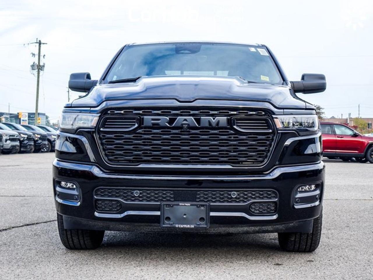 2026 RAM 1500 BLACK EXPRESS Crew Cab 5'7'' Box 3.6L Pentastar V6 eTorque | Black Express Edition | Customer Preferred Package 23D | 20-Inch Wheels Photo