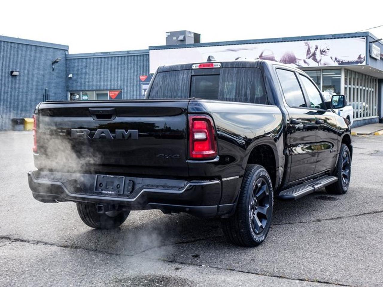 2026 RAM 1500 BLACK EXPRESS Crew Cab 5'7'' Box 3.6L Pentastar V6 eTorque | Black Express Edition | Customer Preferred Package 23D | 20-Inch Wheels Photo