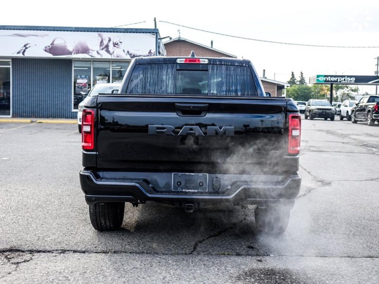 2026 RAM 1500 BLACK EXPRESS Crew Cab 5'7'' Box 3.6L Pentastar V6 eTorque | Black Express Edition | Customer Preferred Package 23D | 20-Inch Wheels Photo