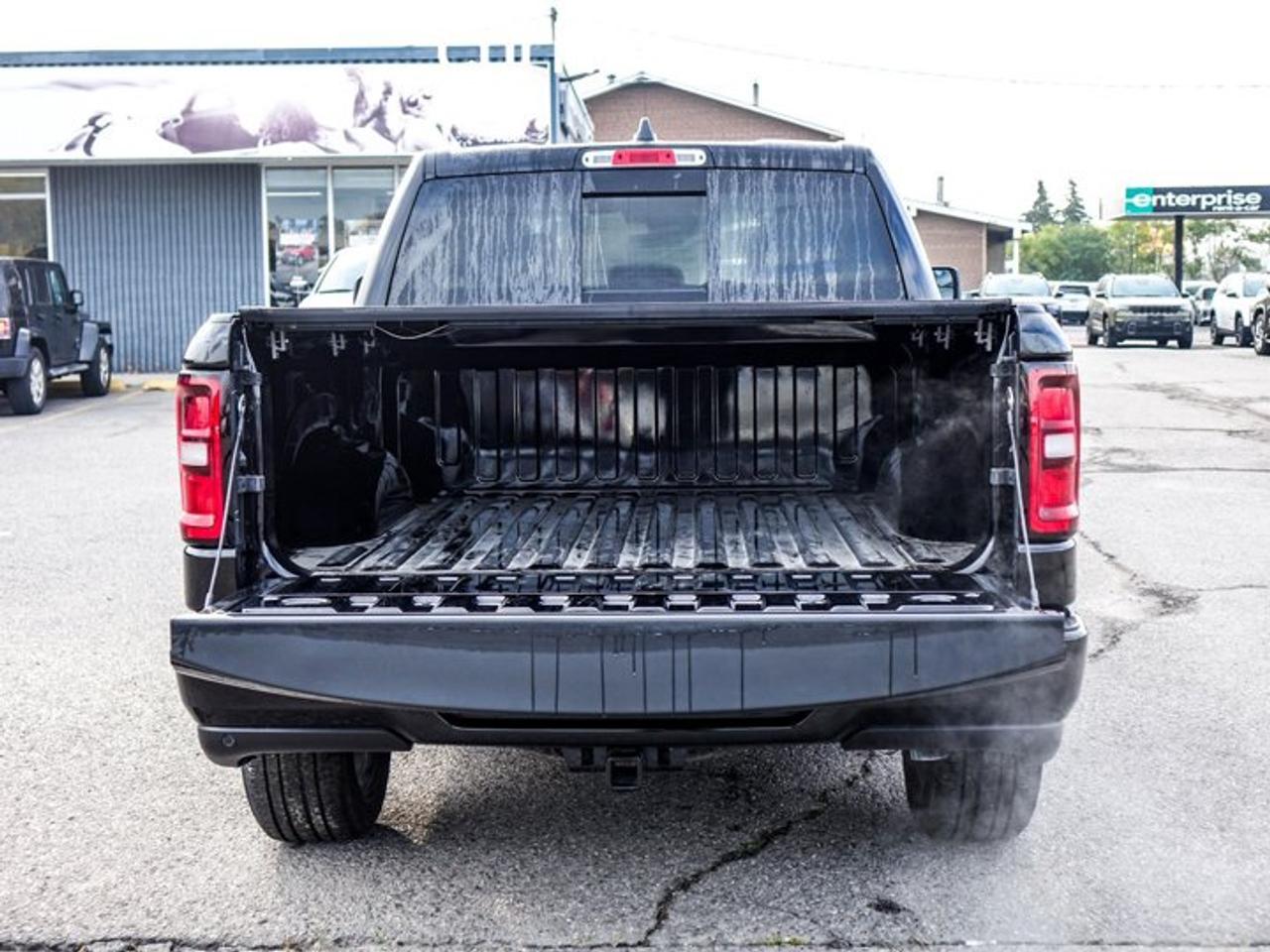 2026 RAM 1500 BLACK EXPRESS Crew Cab 5'7'' Box 3.6L Pentastar V6 eTorque | Black Express Edition | Customer Preferred Package 23D | 20-Inch Wheels Photo