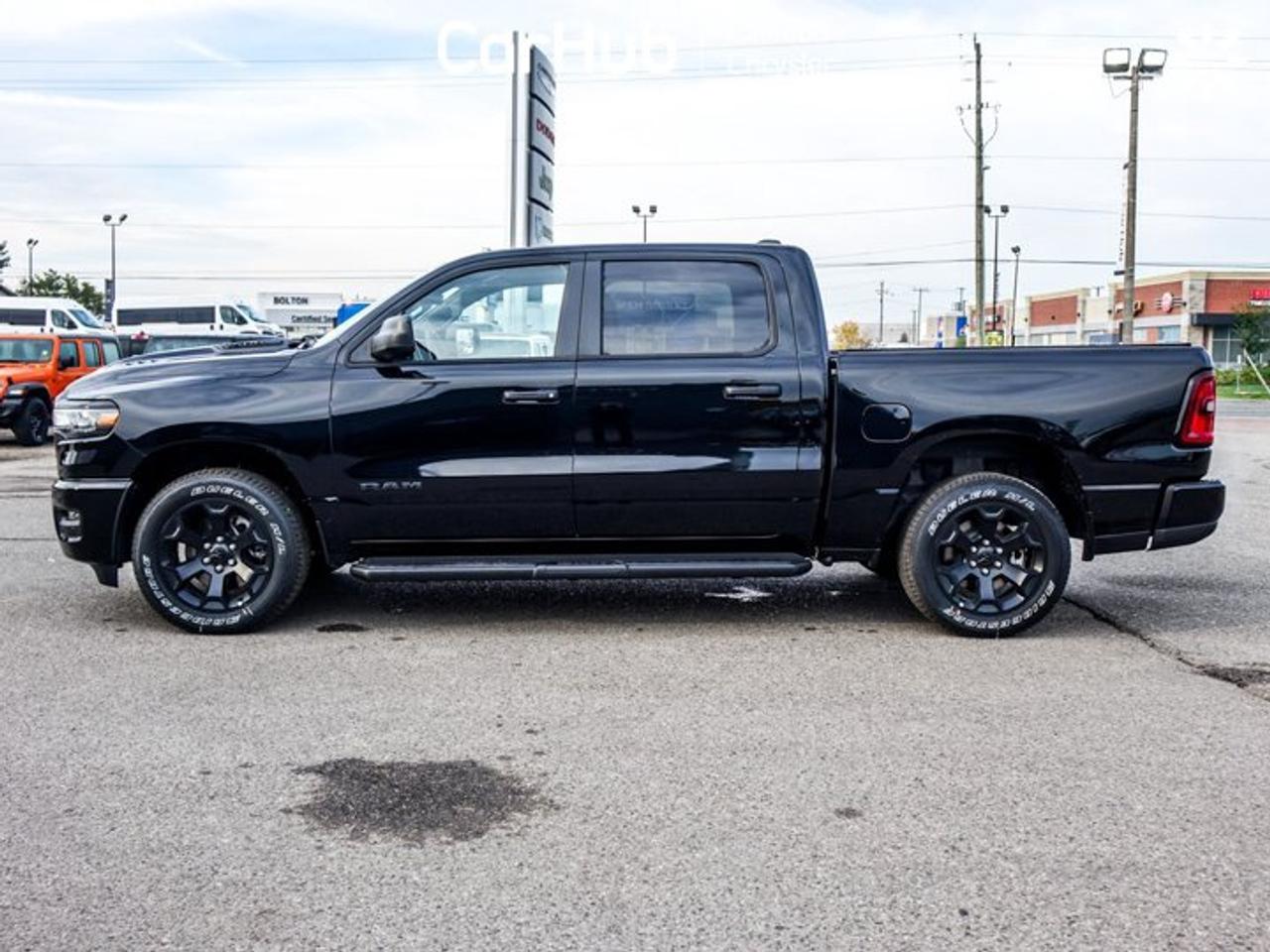 2026 RAM 1500 BLACK EXPRESS Crew Cab 5'7'' Box 3.6L Pentastar V6 eTorque | Black Express Edition | Customer Preferred Package 23D | 20-Inch Wheels Photo