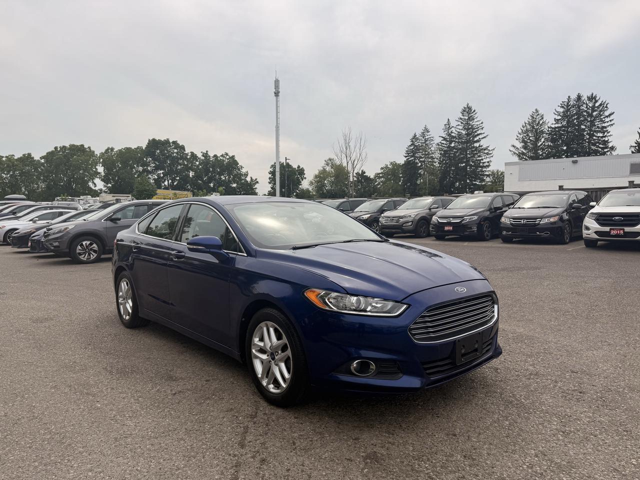Blue 2013 Ford Fusion Sedan Front-Wheel Drive 