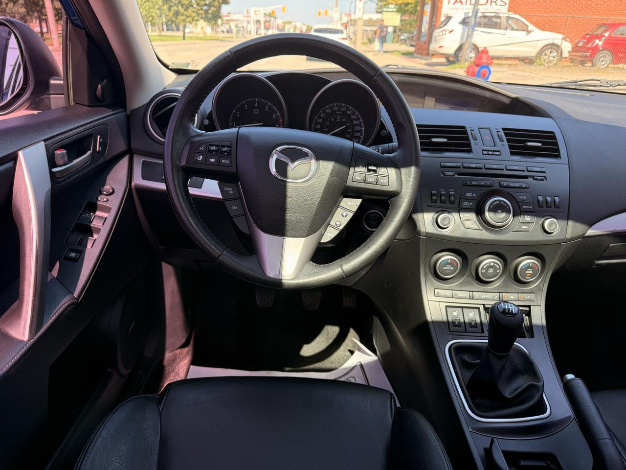 2012 Mazda MAZDA3 4dr Sdn Man GT Photo