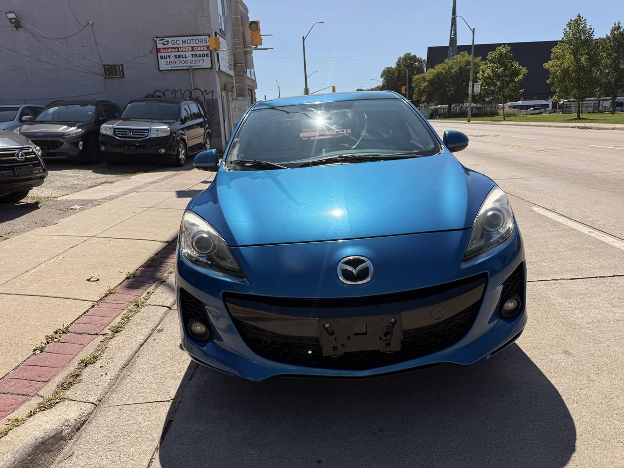 2012 Mazda MAZDA3 4dr Sdn Man GT Photo