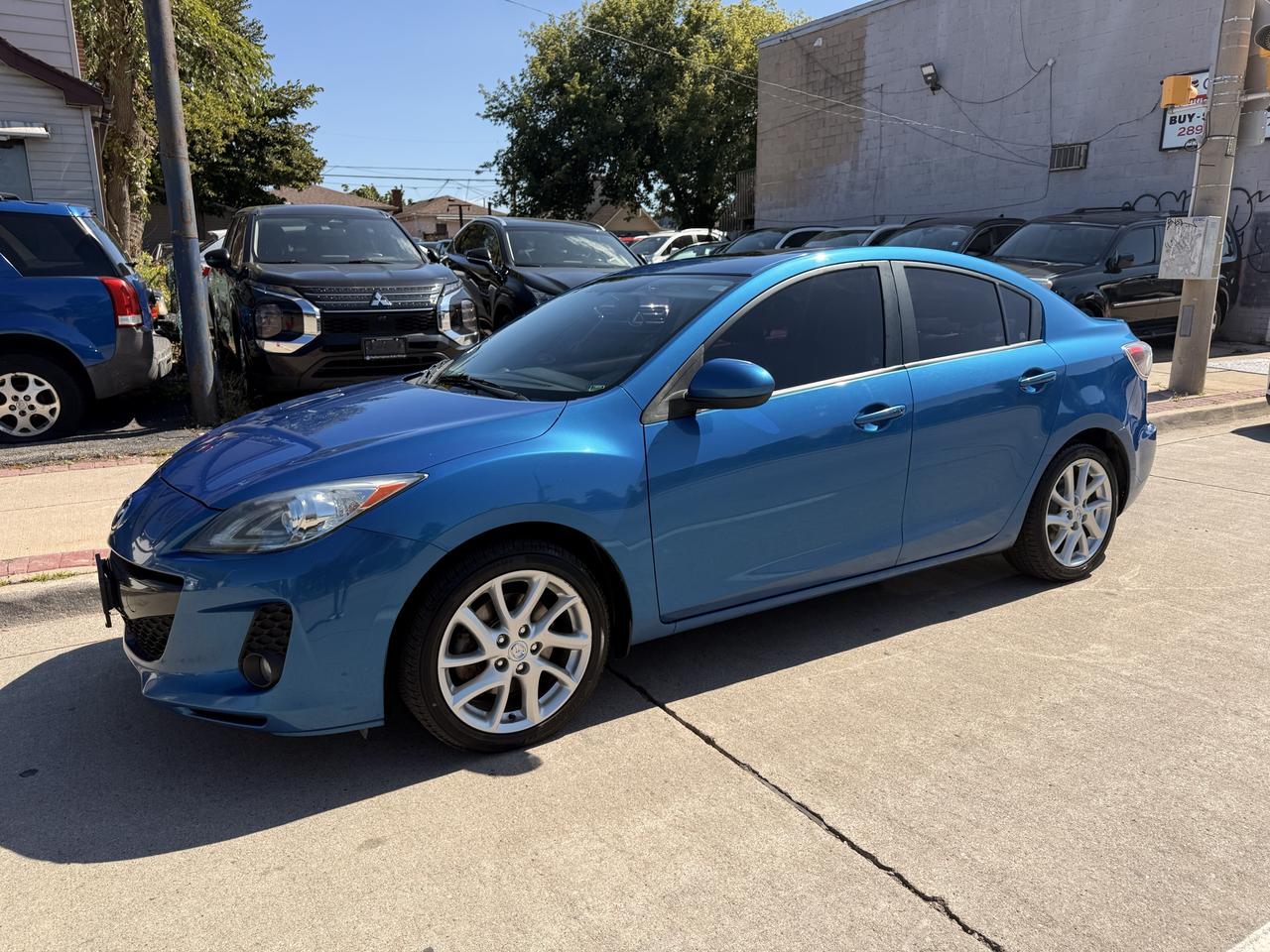 2012 Mazda MAZDA3 4dr Sdn Man GT Photo