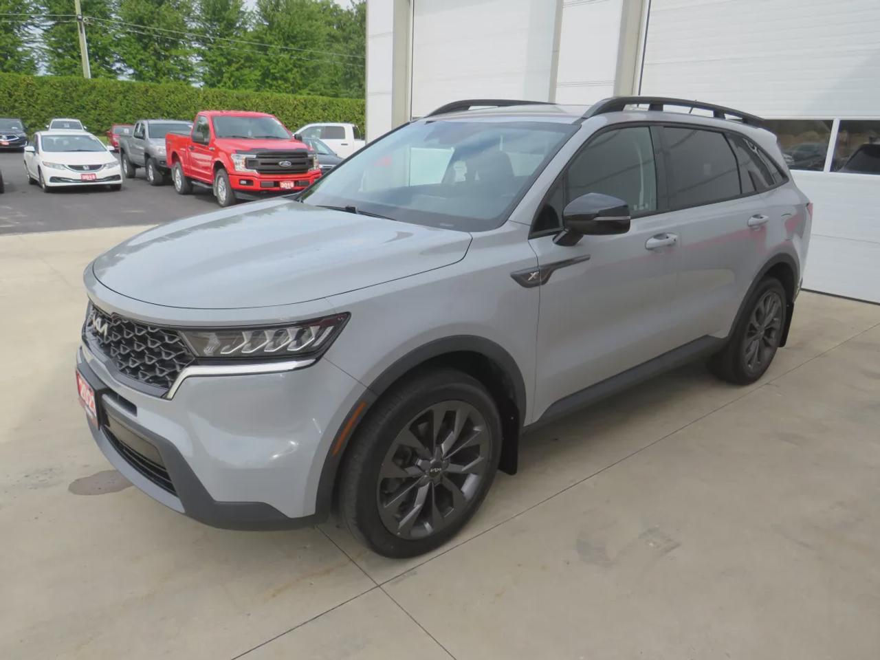 2023 Kia Sorento X-Line | AWD | Automatic | 6-Passenger | Alloy Wheels | Heated Seats | Heated Steering Wheel | Power Driver Seat | Dual-Zone Climate Control | Touchscreen Display | Android Auto & Apple CarPlay | Bluetooth | Wireless Phone Charging | Back-Up Camera | Blin Photo