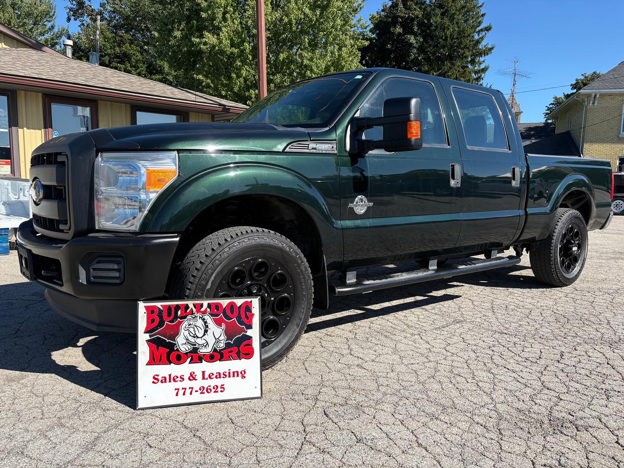 Green Metallic 2016 Ford F-250 Super Duty Pickup Truck Four-Wheel Drive Automatic