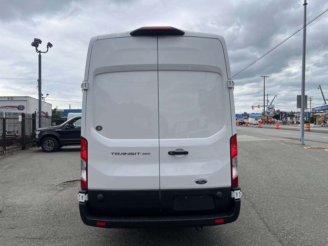 2023 Ford Transit Cargo Van T-350 148" EL Hi Rf 9500 GVWR RWD Photo