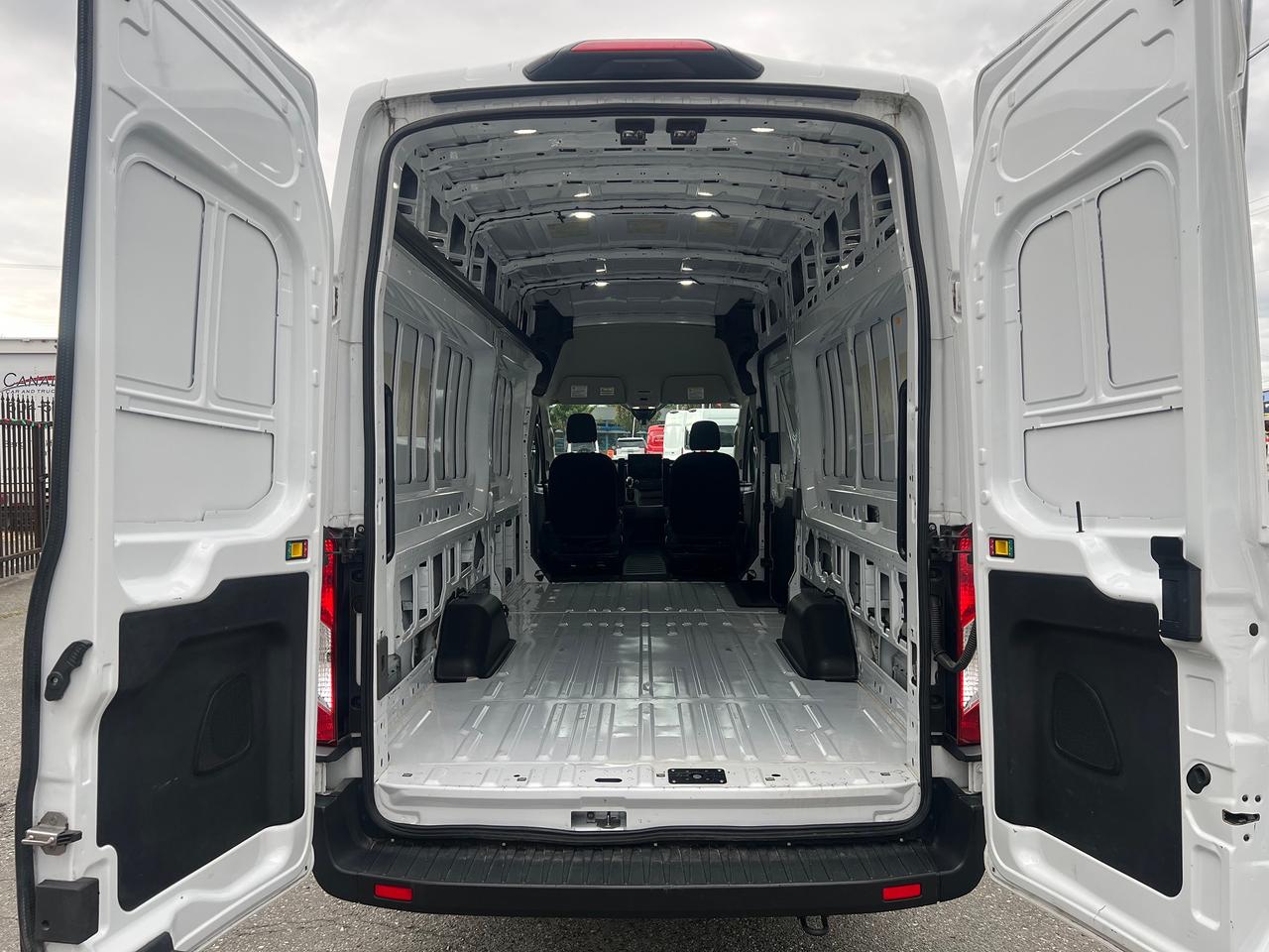 2023 Ford Transit Cargo Van T-350 148" EL Hi Rf 9500 GVWR RWD Photo