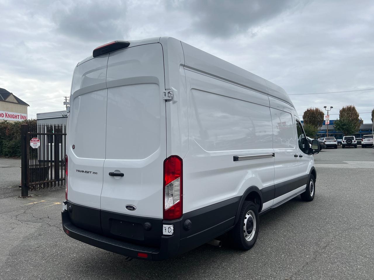 2023 Ford Transit Cargo Van T-350 148" EL Hi Rf 9500 GVWR RWD Photo