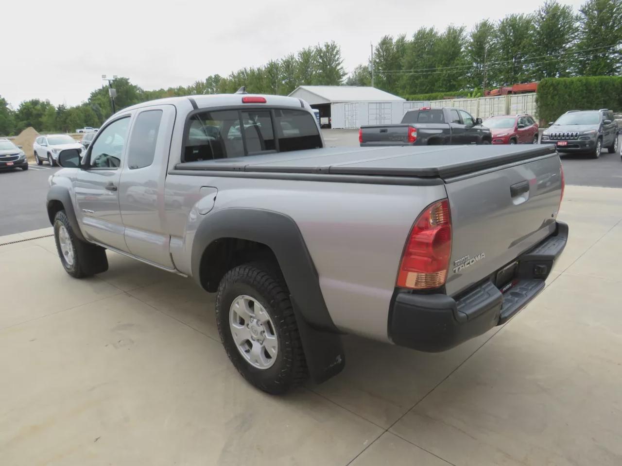 2015 Toyota Tacoma Base V6 | 4WD | Automatic | Access Cab | Low Kms | Touchscreen Display | Bluetooth | Air Conditioning | Cruise Control | Power Windows | Power Mirrors | Sliding Rear Window  | Steering Wheel Audio Controls Photo