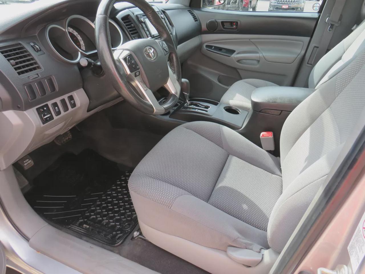 2015 Toyota Tacoma Base V6 | 4WD | Automatic | Access Cab | Low Kms | Touchscreen Display | Bluetooth | Air Conditioning | Cruise Control | Power Windows | Power Mirrors | Sliding Rear Window  | Steering Wheel Audio Controls Photo