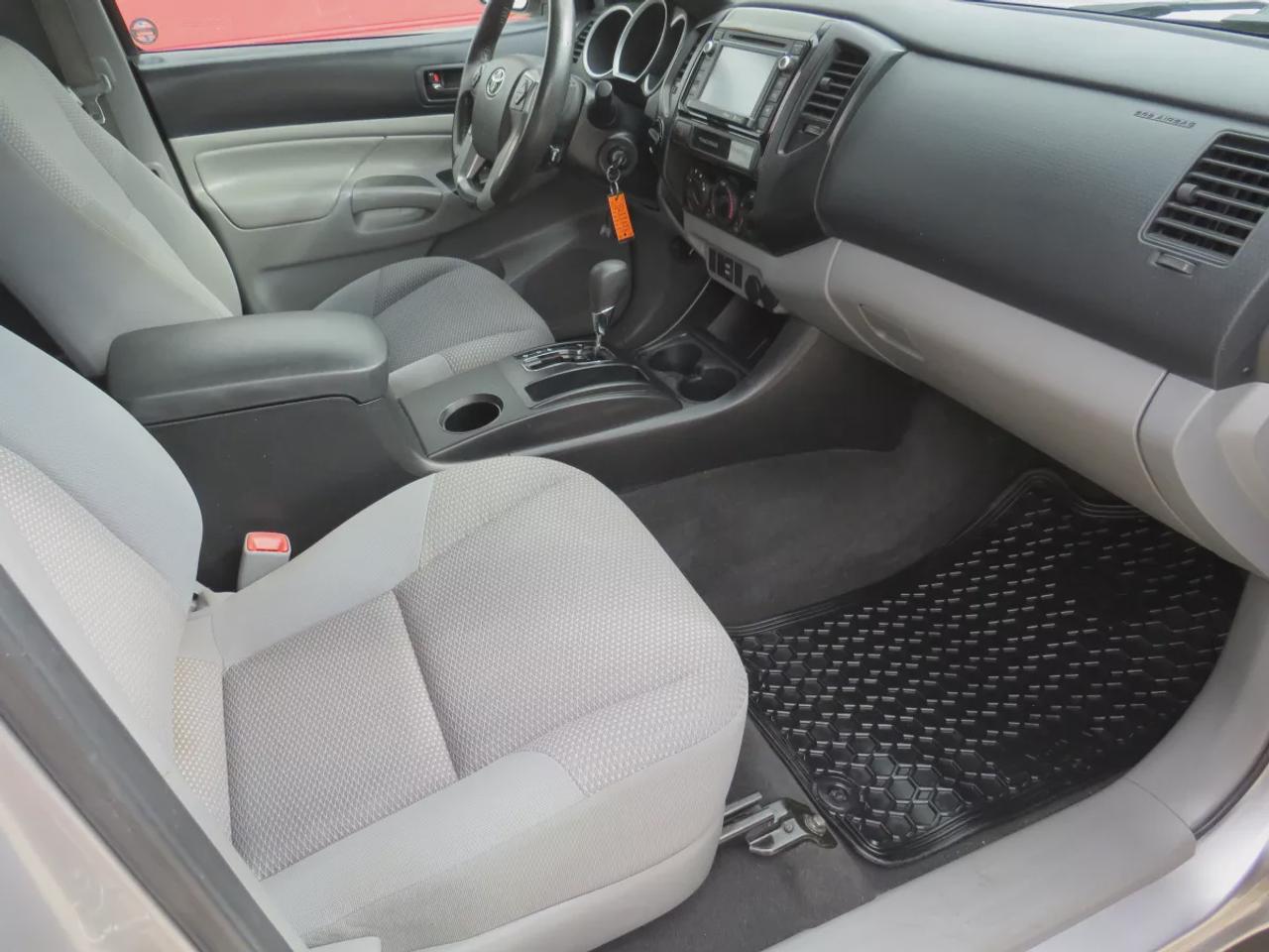2015 Toyota Tacoma Base V6 | 4WD | Automatic | Access Cab | Low Kms | Touchscreen Display | Bluetooth | Air Conditioning | Cruise Control | Power Windows | Power Mirrors | Sliding Rear Window  | Steering Wheel Audio Controls Photo