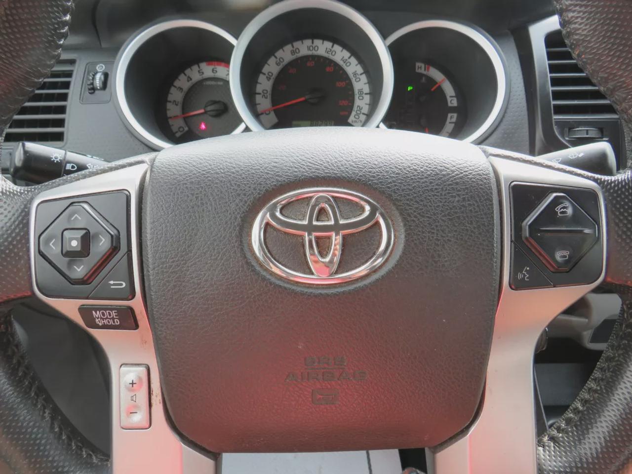 2015 Toyota Tacoma Base V6 | 4WD | Automatic | Access Cab | Low Kms | Touchscreen Display | Bluetooth | Air Conditioning | Cruise Control | Power Windows | Power Mirrors | Sliding Rear Window  | Steering Wheel Audio Controls Photo