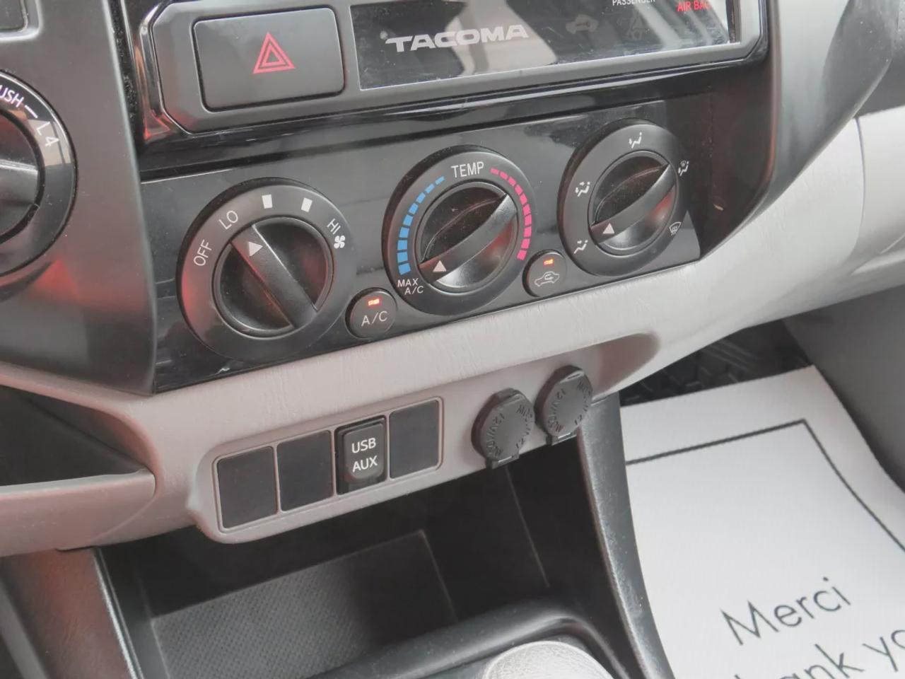 2015 Toyota Tacoma Base V6 | 4WD | Automatic | Access Cab | Low Kms | Touchscreen Display | Bluetooth | Air Conditioning | Cruise Control | Power Windows | Power Mirrors | Sliding Rear Window  | Steering Wheel Audio Controls Photo