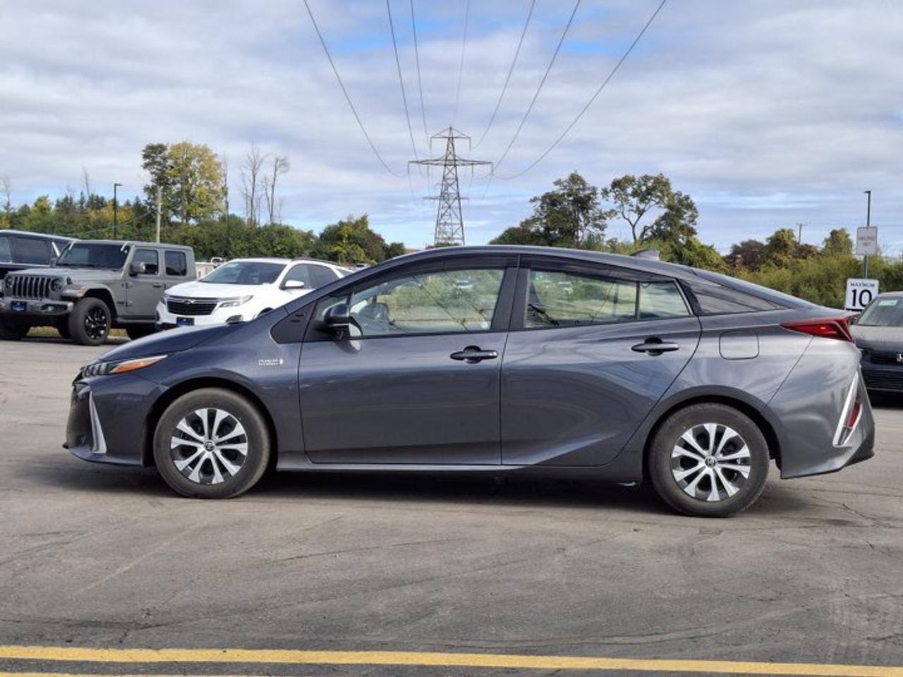 2022 Toyota Prius Prime | Plug-in Hybrid | Heated Steering + Seats | Radar Cruise | CarPlay + Android | Rear Cam and More ! Photo