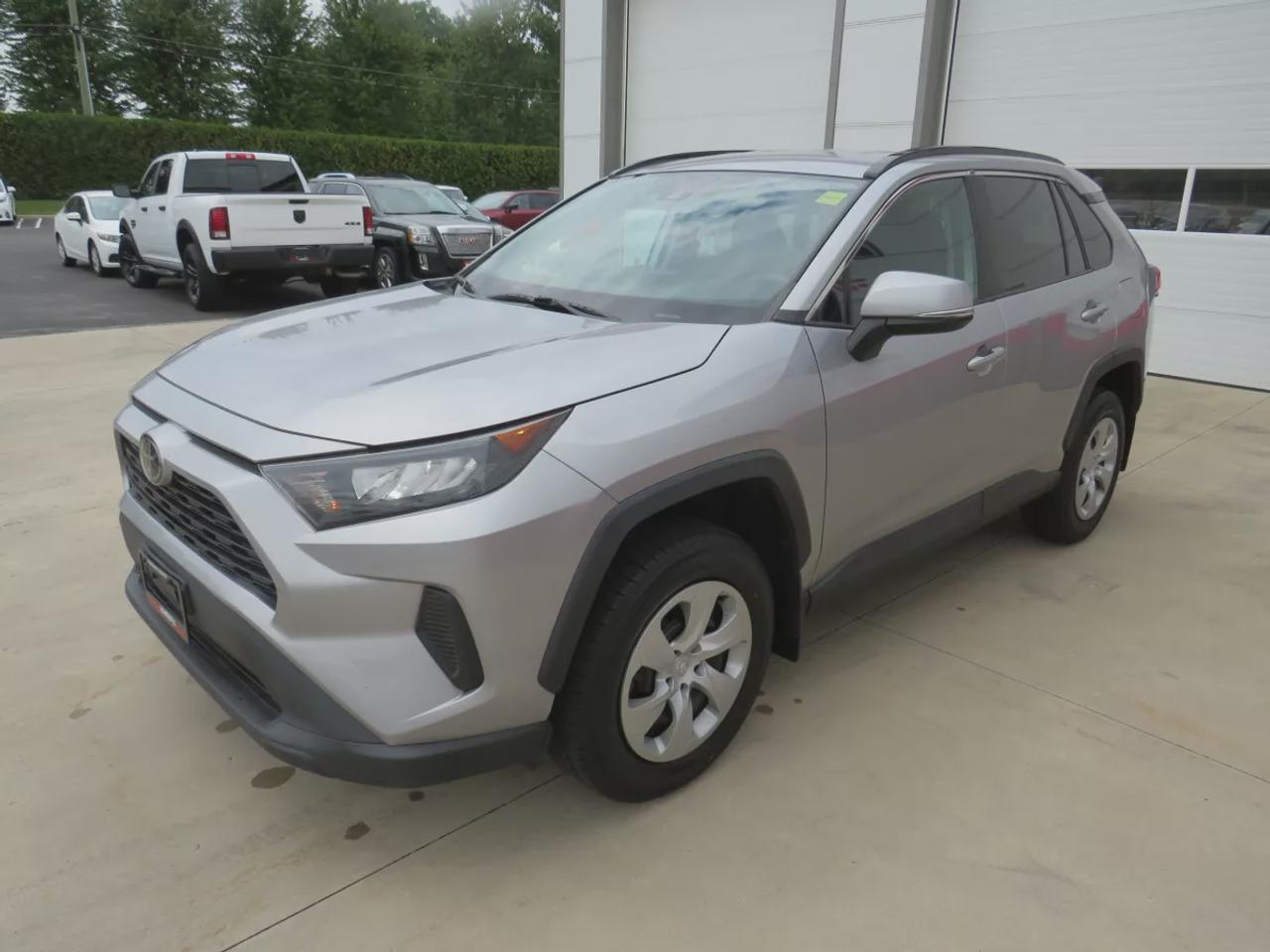2021 Toyota RAV4 LE | FWD | Automatic | Heated Seats | Air Conditioning | Touchscreen Display | Android Auto & Apple CarPlay | Bluetooth | Back-Up Camera | Adaptive Cruise Control | Blind Spot Monitor | Cross Traffic Alert | Lane Tracing Assist | Lane Departure Alert | Pr Photo