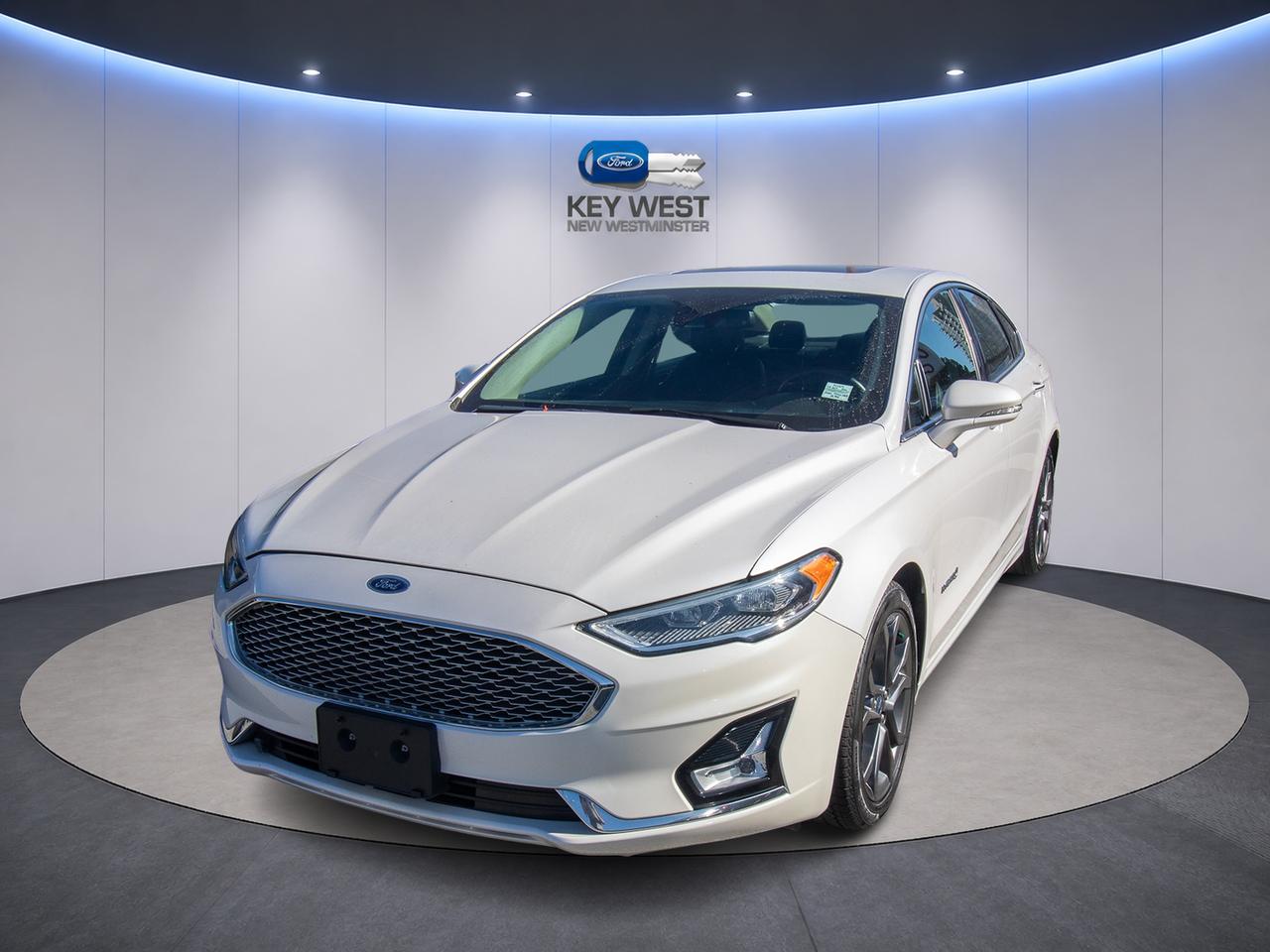 White 2019 Ford Fusion Hybrid Sedan Front-Wheel Drive Continuously Variable Transmission