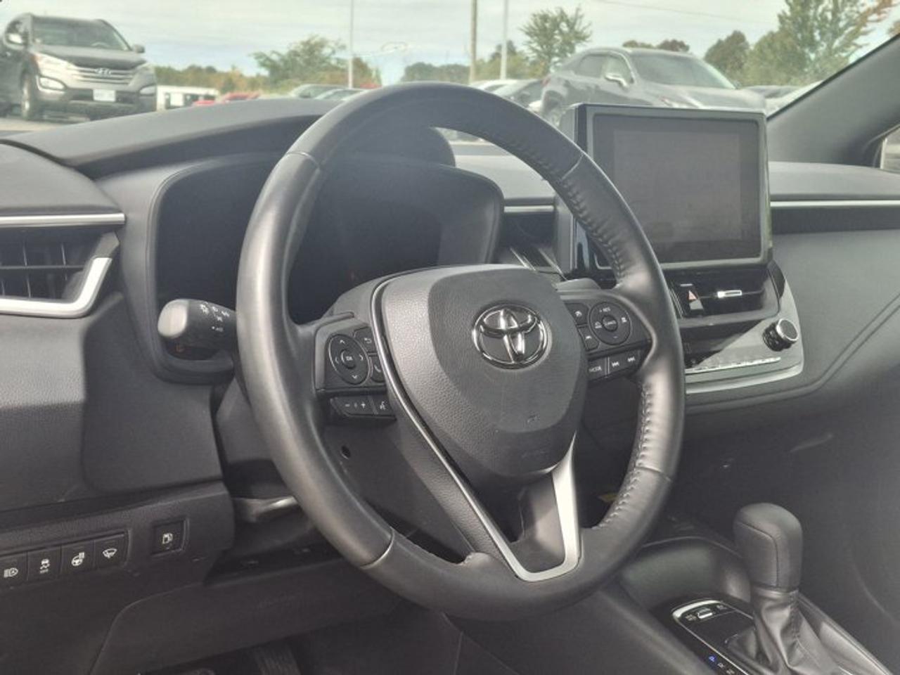 2023 Toyota Corolla Hybrid SE | Sunroof | Heated Seats + Steering | Adaptive Cruise | CarPlay | Rear Cam | and More ! Photo