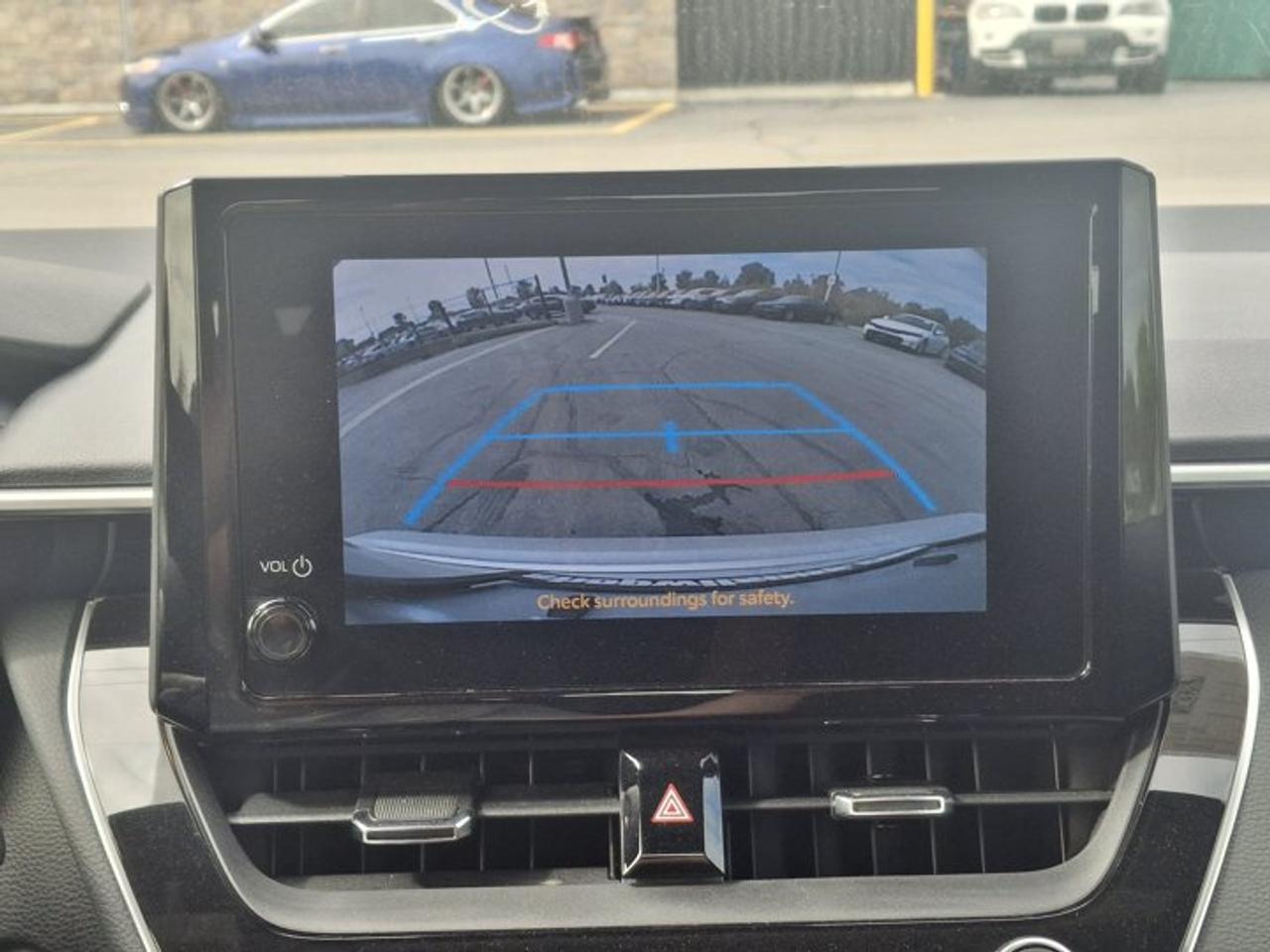 2023 Toyota Corolla Hybrid SE | Sunroof | Heated Seats + Steering | Adaptive Cruise | CarPlay | Rear Cam | and More ! Photo