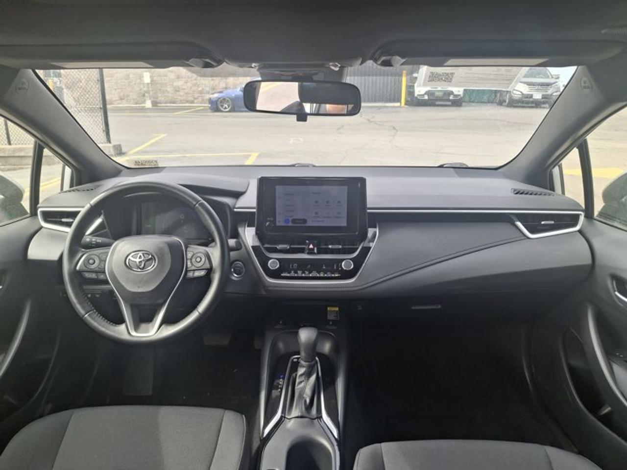 2023 Toyota Corolla Hybrid SE | Sunroof | Heated Seats + Steering | Adaptive Cruise | CarPlay | Rear Cam | and More ! Photo