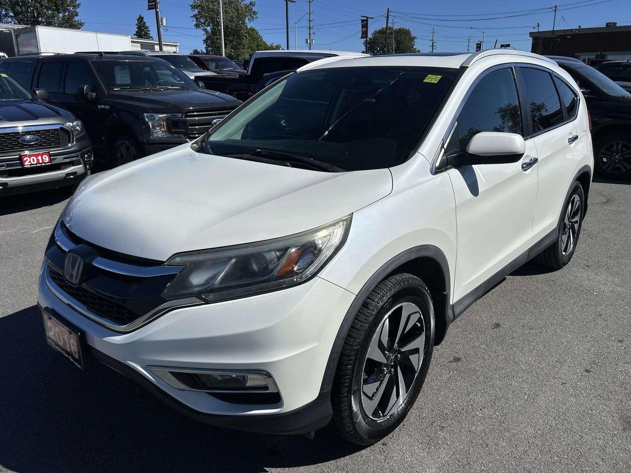 2016 Honda CR-V TOURING AWD | HTD LEATHER | SUNROOF | NAV | ALLOYS Photo0